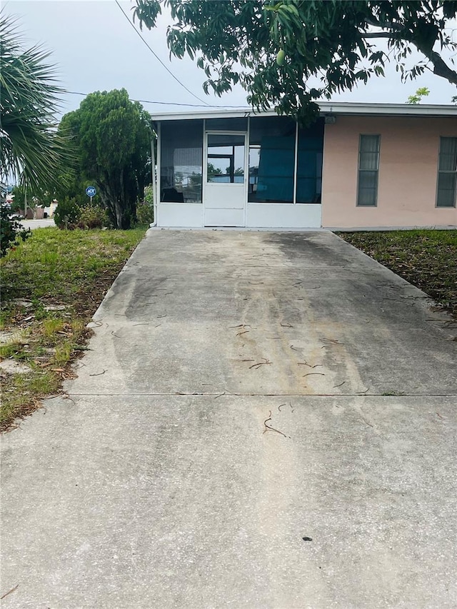 72 Lake Shore Dr, Palm Harbor, FL 34684 - view of front of home featuring concrete driveway