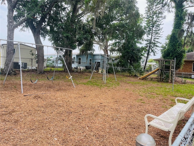 72 Lake Shore Dr, Palm Harbor, FL 34684 - view of yard with a playground