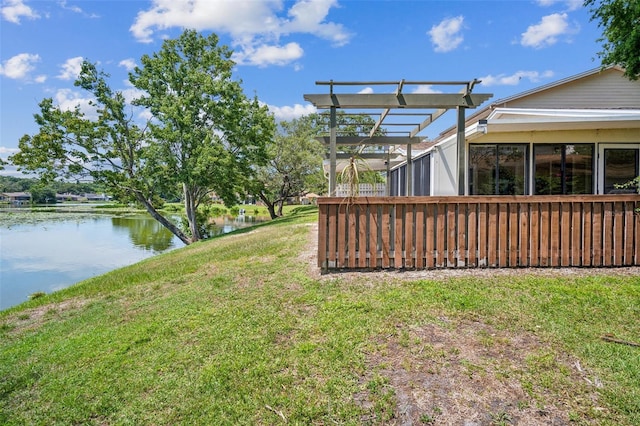15202 Morning Dr, Lutz, FL 33559 - view of green lawn with a water view and a pergola