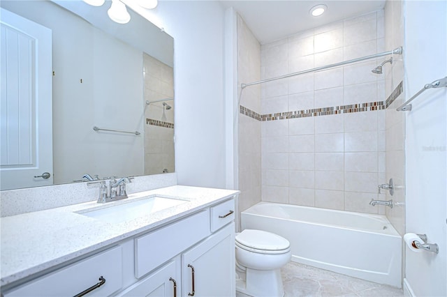 6119 Bradford Woods Dr, Zephyrhills, FL 33542 - bathroom with vanity, toilet, bathtub / shower combination, tile patterned floors, and recessed lighting