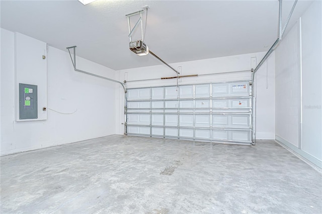 6119 Bradford Woods Dr, Zephyrhills, FL 33542 - garage featuring a garage door opener and electric panel
