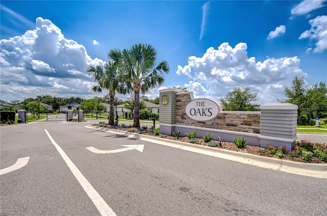 6119 Bradford Woods Dr, Zephyrhills, FL 33542 - community sign with a gate