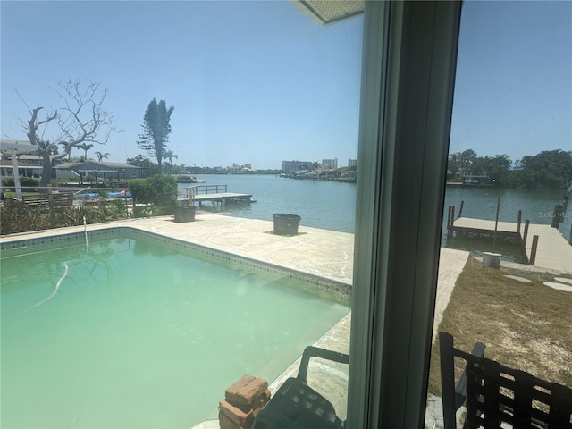 7832 3rd Ave S, Saint Petersburg, FL 33707 - outdoor pool featuring a water view and a dock