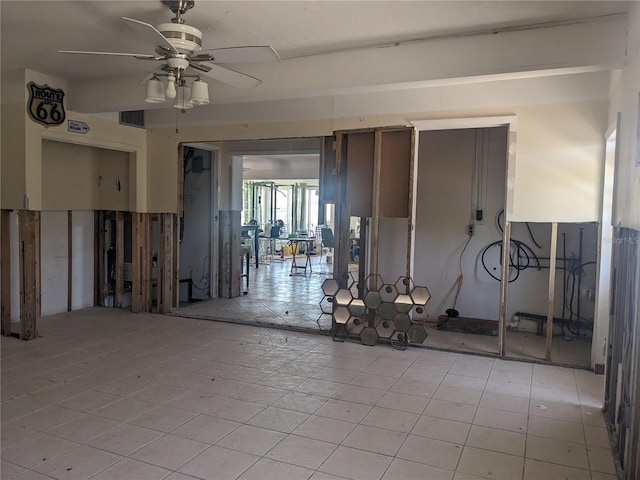 7832 3rd Ave S, Saint Petersburg, FL 33707 - miscellaneous room with ceiling fan and light tile patterned flooring