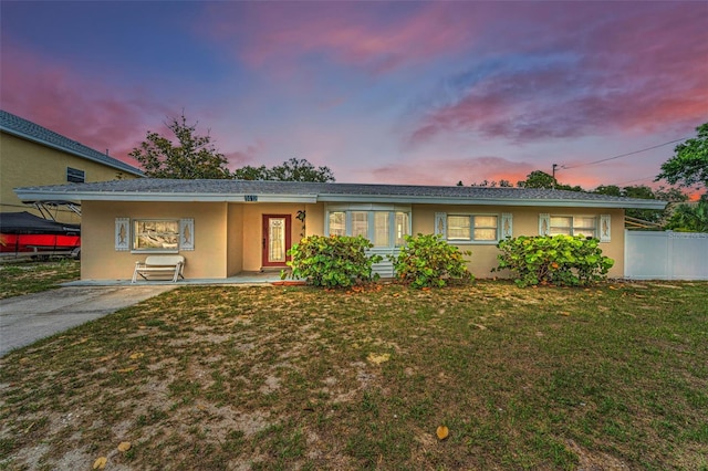 1412 Coburn Dr, Tarpon Springs, FL 34689 - ranch-style house featuring stucco siding