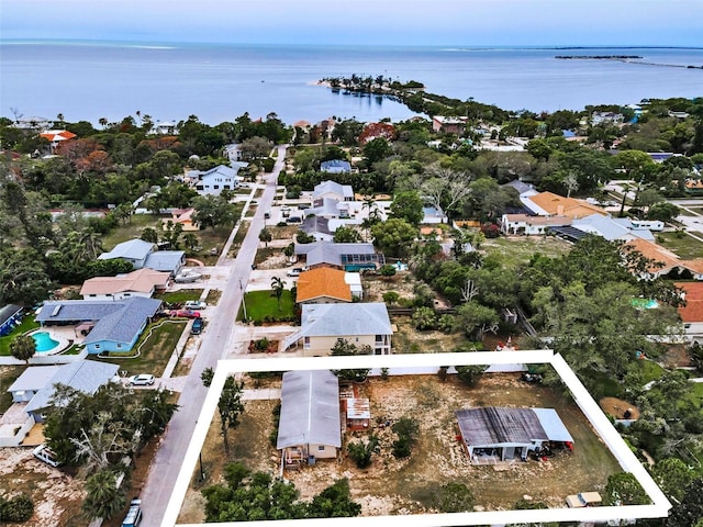 1412 Coburn Dr, Tarpon Springs, FL 34689 - aerial perspective of suburban area with a large body of water