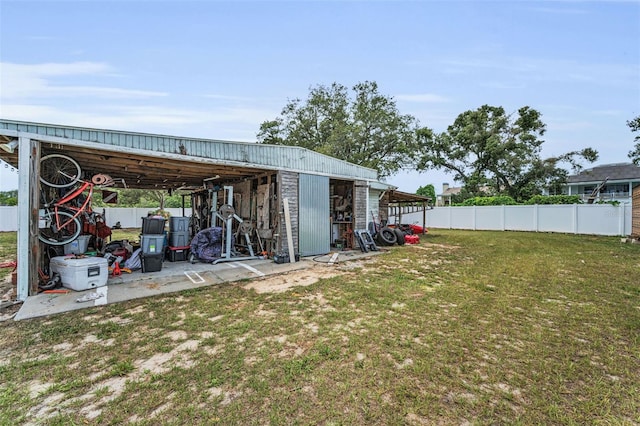 1412 Coburn Dr, Tarpon Springs, FL 34689 - view of yard featuring a pole building and an outdoor structure
