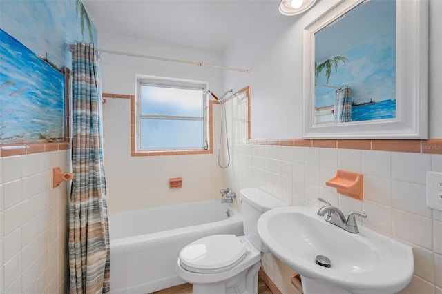1412 Coburn Dr, Tarpon Springs, FL 34689 - bathroom with a sink, tile walls, shower / tub combo, and toilet