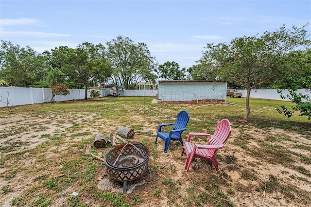 1412 Coburn Dr, Tarpon Springs, FL 34689 - view of yard featuring a fire pit