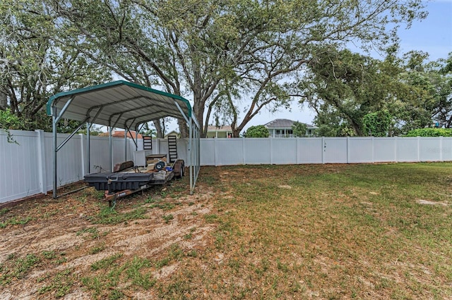 1412 Coburn Dr, Tarpon Springs, FL 34689 - view of yard featuring a carport