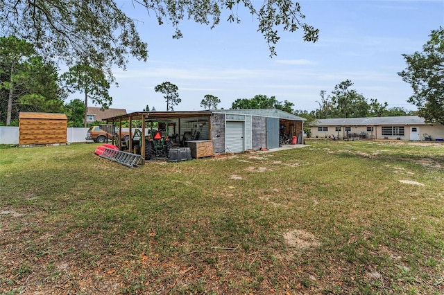 1412 Coburn Dr, Tarpon Springs, FL 34689 - view of grassy yard with an outdoor structure