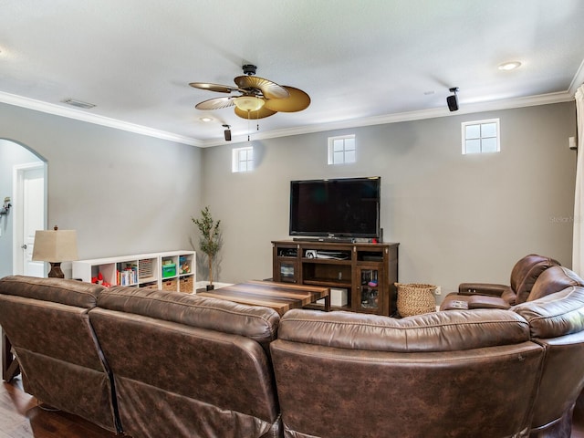 3003 W Leila Ave, Tampa, FL 33611 - living area featuring a ceiling fan, ornamental molding, wood finished floors, and arched walkways