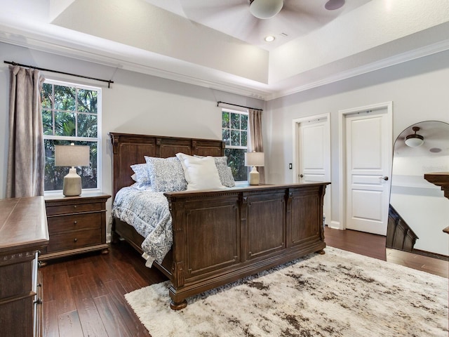 3003 W Leila Ave, Tampa, FL 33611 - bedroom with dark wood-type flooring, a tray ceiling, ceiling fan, ornamental molding, and recessed lighting