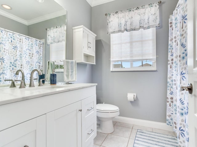 3003 W Leila Ave, Tampa, FL 33611 - full bathroom with ornamental molding, vanity, toilet, baseboards, and tile patterned floors