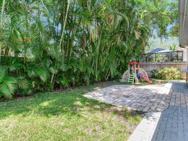 3003 W Leila Ave, Tampa, FL 33611 - view of yard with a playground