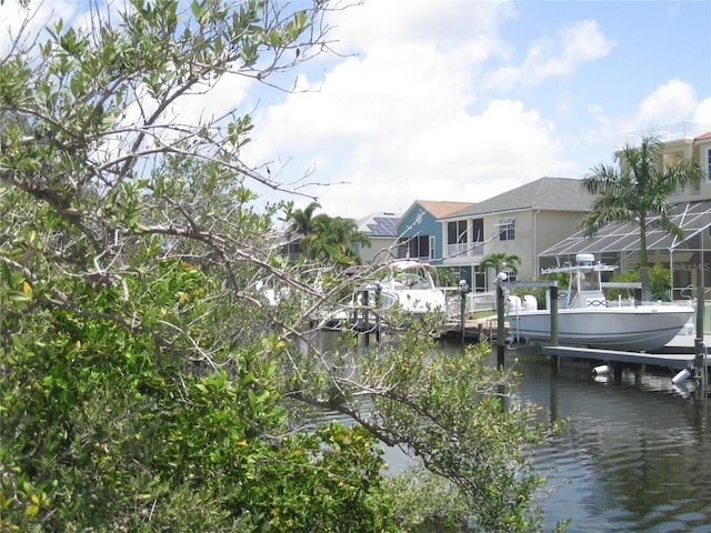 4673 Dewey Dr, New Port Richey, FL 34652 - dock area featuring a water view and boat lift