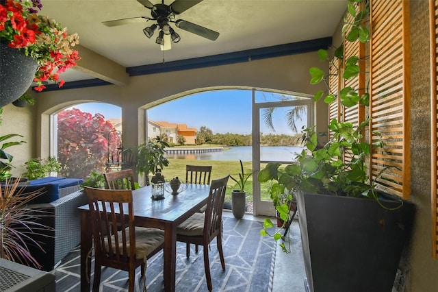 17 Franklin Ct S Unit C, Saint Petersburg, FL 33711 - sunroom / solarium featuring a water view, healthy amount of natural light, and beam ceiling