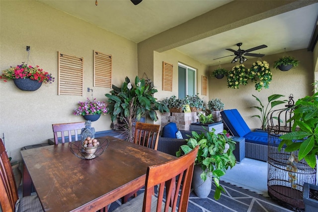 17 Franklin Ct S Unit C, Saint Petersburg, FL 33711 - view of patio featuring outdoor dining space and a ceiling fan