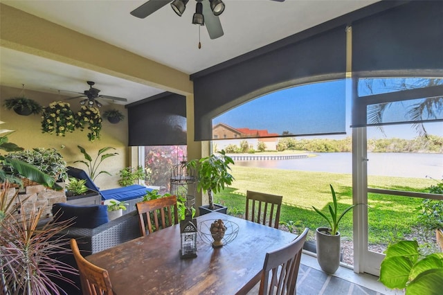 17 Franklin Ct S Unit C, Saint Petersburg, FL 33711 - view of patio / terrace featuring ceiling fan, a water view, and outdoor dining area