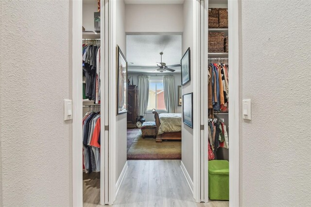 17 Franklin Ct S Unit C, Saint Petersburg, FL 33711 - corridor with a textured wall, wood finished floors, and baseboards
