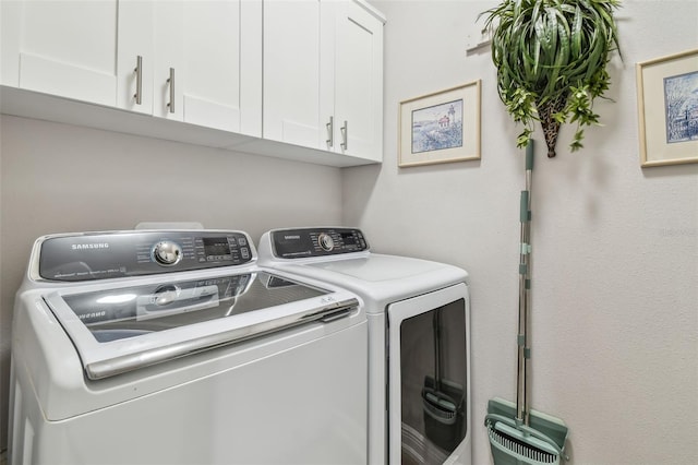 17 Franklin Ct S Unit C, Saint Petersburg, FL 33711 - laundry room with cabinet space and separate washer and dryer