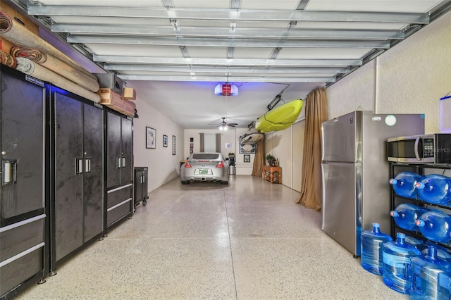 17 Franklin Ct S Unit C, Saint Petersburg, FL 33711 - garage with freestanding refrigerator and a ceiling fan
