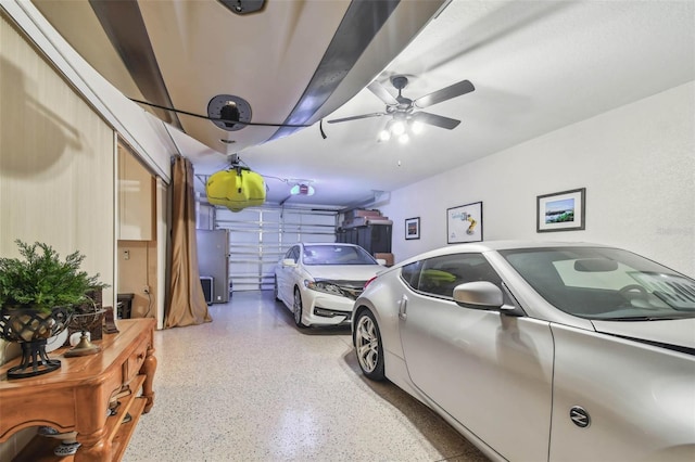 17 Franklin Ct S Unit C, Saint Petersburg, FL 33711 - garage with ceiling fan and a garage door opener