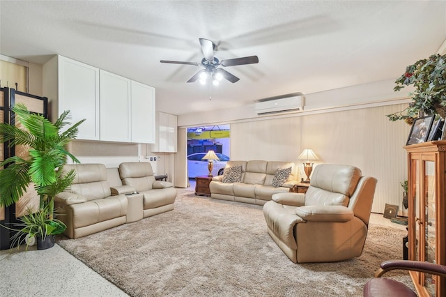 17 Franklin Ct S Unit C, Saint Petersburg, FL 33711 - living area with a wall mounted AC, ceiling fan, and speckle patterned floor