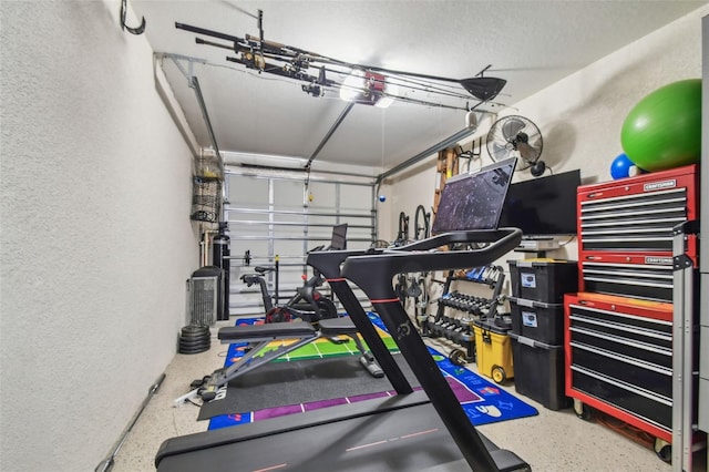 17 Franklin Ct S Unit C, Saint Petersburg, FL 33711 - workout area with a textured wall and a garage