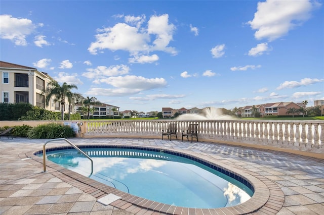 17 Franklin Ct S Unit C, Saint Petersburg, FL 33711 - view of swimming pool featuring a residential view and a swimming pool