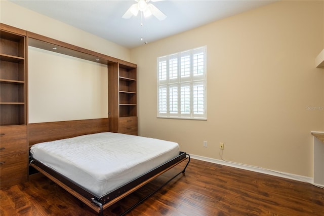 21209 Diamonte Dr, Land O Lakes, FL 34637 - bedroom with baseboards, dark wood-style flooring, and a ceiling fan