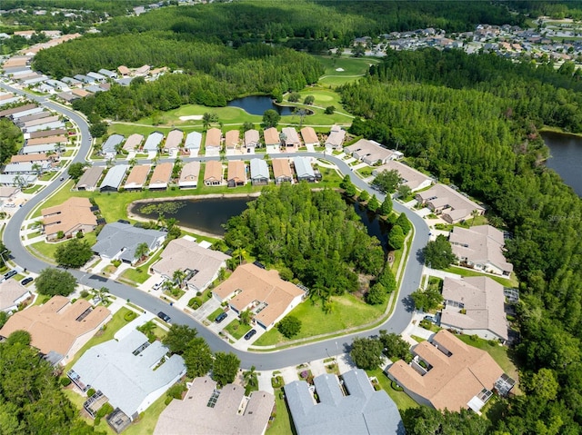 21209 Diamonte Dr, Land O Lakes, FL 34637 - aerial view of property and surrounding area with a large body of water, nearby suburban area, and a local golf course