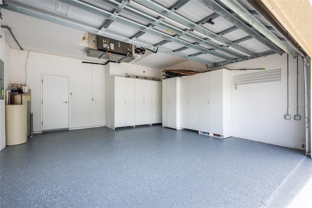 21209 Diamonte Dr, Land O Lakes, FL 34637 - garage featuring a garage door opener
