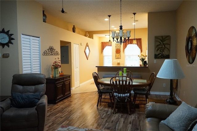 311 Kelsey Way Unit 3, Sun City Center, FL 33573 - dining room featuring a chandelier and wood finished floors