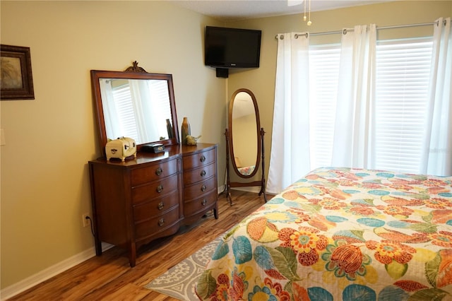 311 Kelsey Way Unit 3, Sun City Center, FL 33573 - bedroom with light wood finished floors