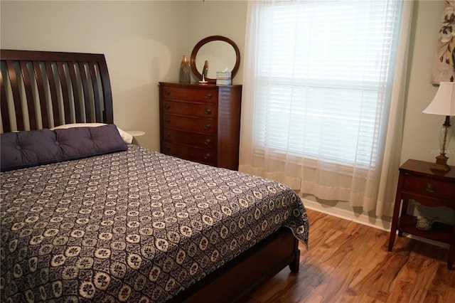 311 Kelsey Way Unit 3, Sun City Center, FL 33573 - bedroom with wood finished floors