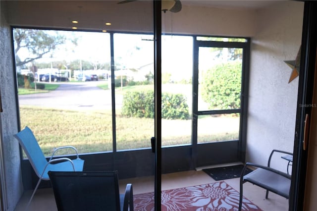 311 Kelsey Way Unit 3, Sun City Center, FL 33573 - sunroom / solarium with healthy amount of natural light and a ceiling fan