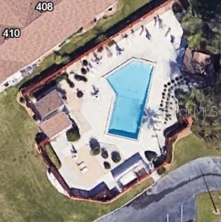 311 Kelsey Way Unit 3, Sun City Center, FL 33573 - aerial overview of property's location with a pool area