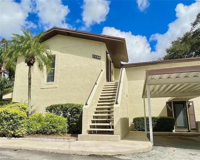 501 E Bay Dr Unit 3504, Largo, FL 33770 - entrance to property with stucco siding