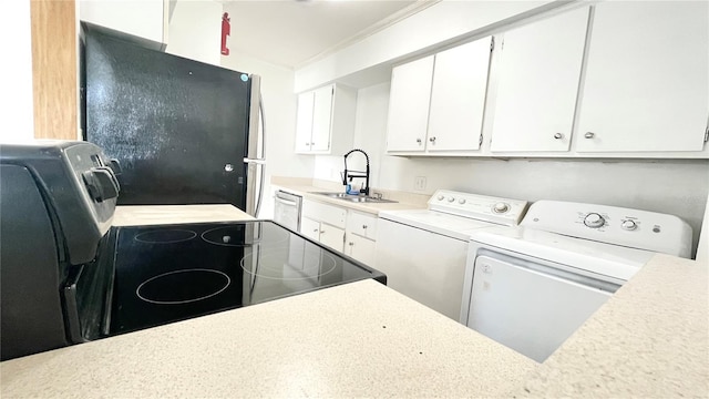 501 E Bay Dr Unit 3504, Largo, FL 33770 - laundry area featuring independent washer and dryer and crown molding
