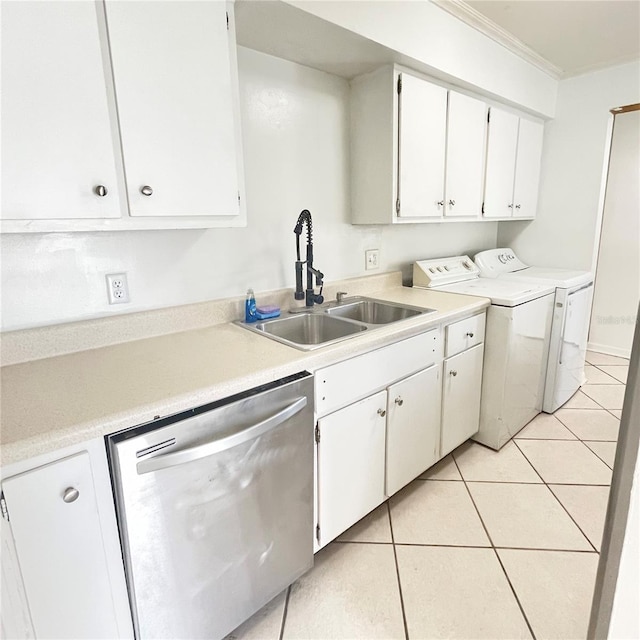 501 E Bay Dr Unit 3504, Largo, FL 33770 - kitchen with dishwasher, a sink, washing machine and dryer, light tile patterned floors, and white cabinetry