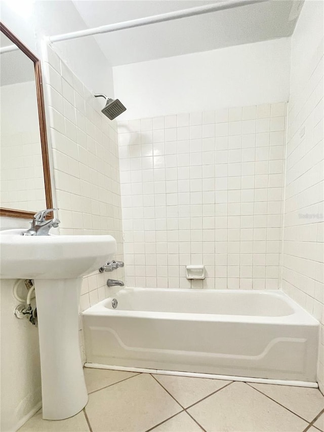 501 E Bay Dr Unit 3504, Largo, FL 33770 - bathroom with tile patterned floors, washtub / shower combination, and a sink