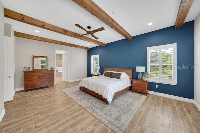 14223 Lambert Bridge Ln, Lithia, FL 33547 - bedroom featuring beam ceiling, baseboards, wood finished floors, recessed lighting, and ensuite bath