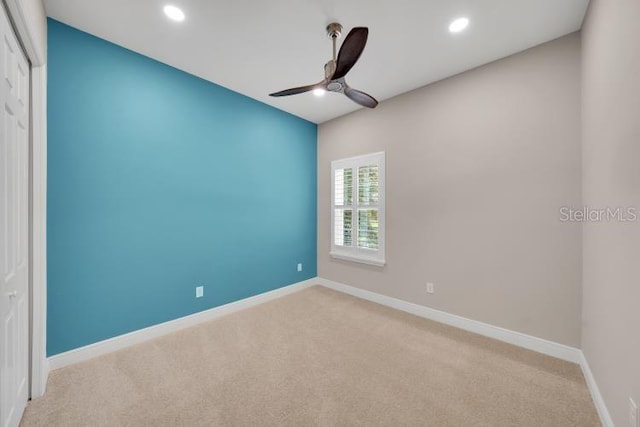14223 Lambert Bridge Ln, Lithia, FL 33547 - spare room with light carpet, ceiling fan, recessed lighting, and baseboards