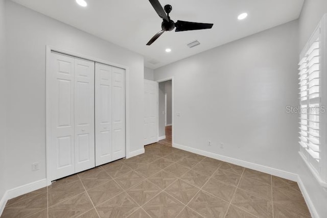 14223 Lambert Bridge Ln, Lithia, FL 33547 - unfurnished bedroom with baseboards, a closet, recessed lighting, and ceiling fan