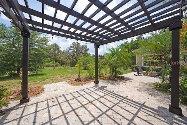 14223 Lambert Bridge Ln, Lithia, FL 33547 - view of patio with a pergola
