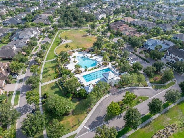 14223 Lambert Bridge Ln, Lithia, FL 33547 - view of property location with a pool and nearby suburban area