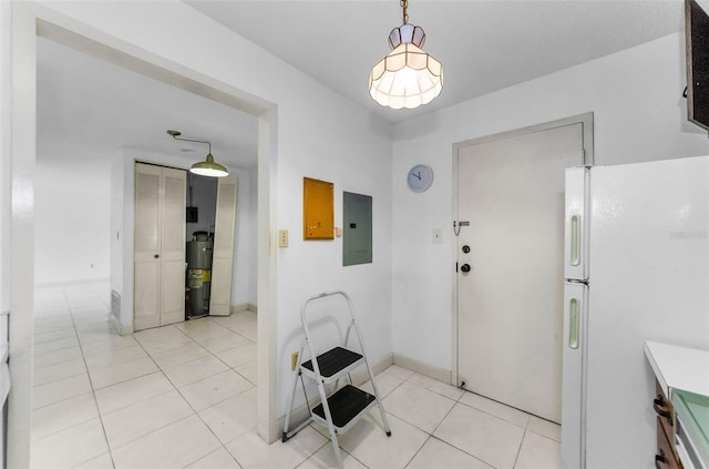 2700 Bayshore Blvd Unit 2110, Dunedin, FL 34698 - foyer with electric panel, electric water heater, light tile patterned floors, and baseboards