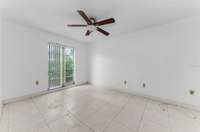 2700 Bayshore Blvd Unit 2110, Dunedin, FL 34698 - empty room with a ceiling fan and baseboards