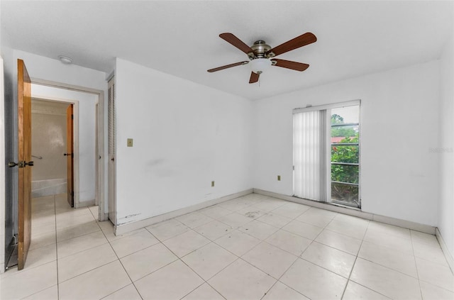 2700 Bayshore Blvd Unit 2110, Dunedin, FL 34698 - empty room featuring baseboards, ceiling fan, and a smoke detector